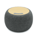 Boomer Bamboo Wireless Speaker - A round, grey wireless speaker with a bamboo top and control buttons, featuring a logo on the surface.