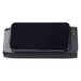 Trekk Outdoor Speaker & Wireless Powerbank - A black outdoor speaker and wireless power bank with a sleek design and a glossy surface. It features a logo.