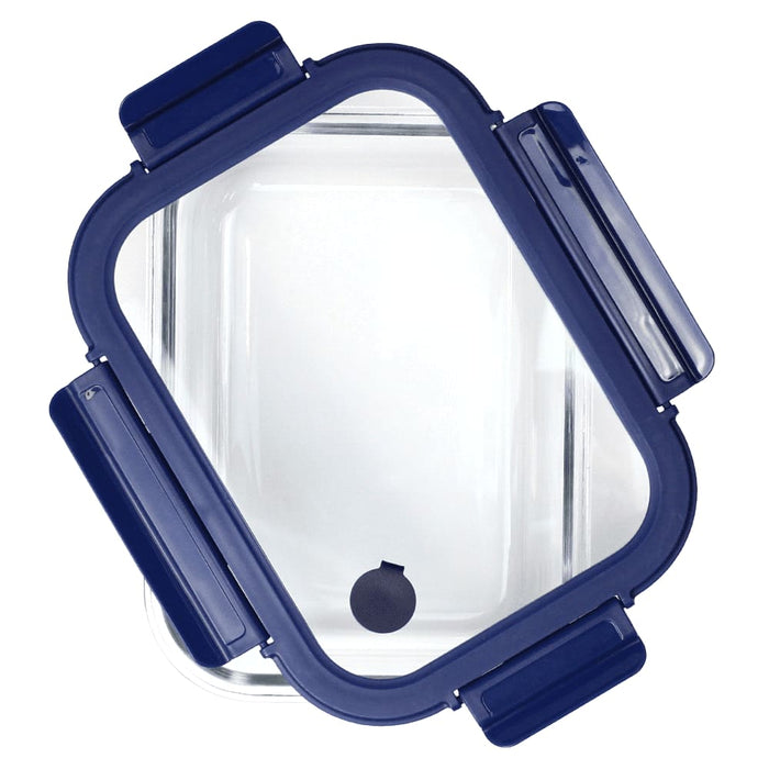 Trekk Crib Glass Lunch Box - A glass lunch box with a navy blue lid and clips, featuring a square shape and a small silicone vent.