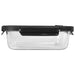 Trekk Crib Glass Lunch Box - A glass lunch box with a black lid and clips, featuring a clear glass body. It has a sleek and modern design.