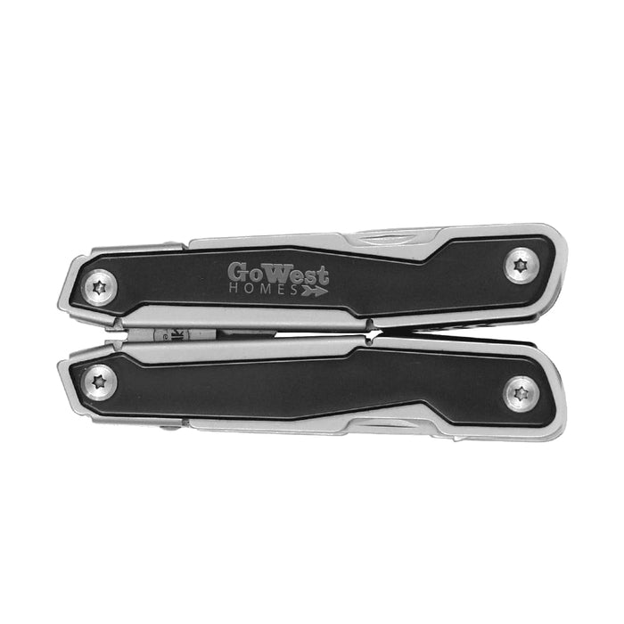 Trekk Multifunction Tool - A multifunction tool featuring a black and silver design with a logo, showcasing a compact and sleek appearance.