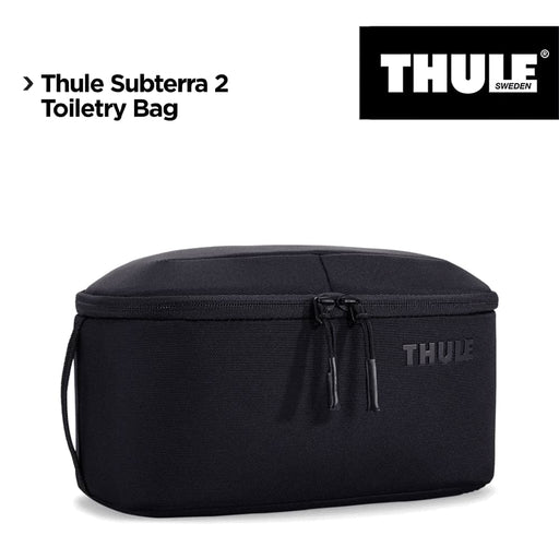 Thule Subterra 2 Toiletry Bag w/ Removable Pouch - A black Thule Subterra 2 Toiletry Bag with a removable pouch and a logo on the side.