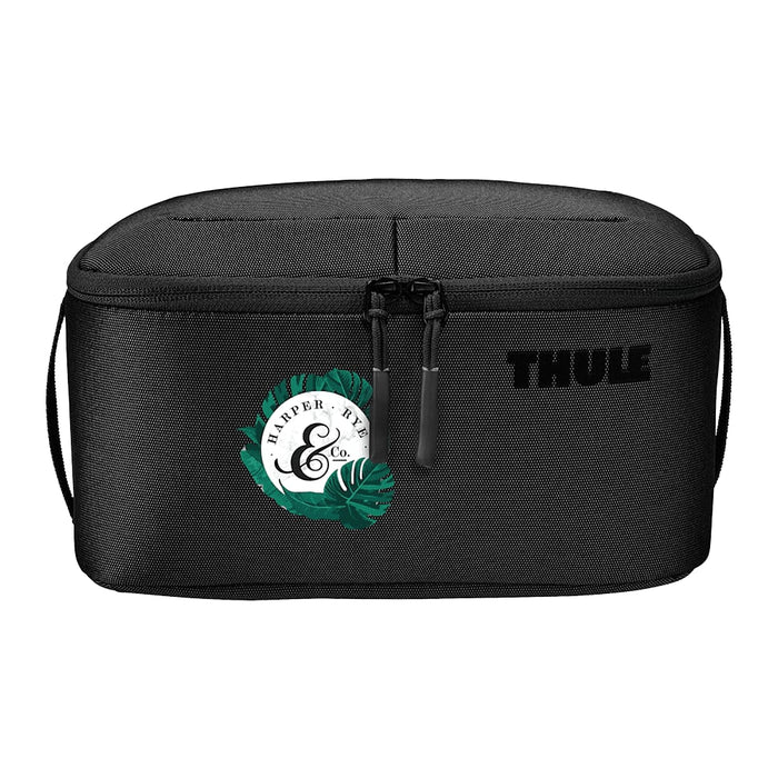 Thule Subterra 2 Toiletry Bag w/ Removable Pouch - A black toiletry bag with a removable pouch and a logo on the side, featuring leafy designs.