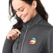 Women's Joris Eco Waterproof Softshell Jacket - A grey women's softshell jacket with a zippered pocket, featuring a colourful logo on the chest.