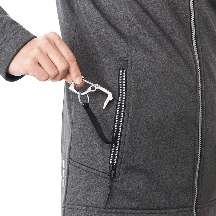 Women's Joris Eco Waterproof Softshell Jacket - A grey softshell jacket with a hand reaching into a zippered pocket, featuring a pull tab.