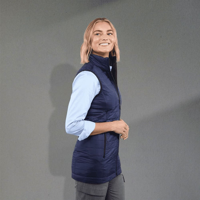 Women's Telluride Lightweight Packable Insulated Puffer Vest - A lightweight, packable insulated puffer vest in navy blue, featuring a high collar and zippered pockets.
