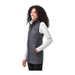 Women's Telluride Lightweight Packable Insulated Puffer Vest - A lightweight, packable insulated puffer vest in dark grey, featuring a sleek design and a logo on the chest.