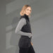 Women's Telluride Lightweight Packable Insulated Puffer Vest - A lightweight packable insulated puffer vest in black, featuring a sleek design and a high neckline.