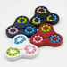 The Spin Buddy Puzzle Game - A set of four Spin Buddy Puzzle Games in red, white, black, and navy, featuring colourful beads in pink, green, and blue.