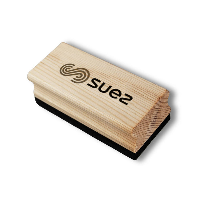Bonack Wood Whiteboard Eraser - A wooden whiteboard eraser with a smooth wooden top and a black felt bottom. It features a logo.