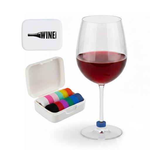 Wine Glass Marker - A wine glass filled with red wine beside a white case containing colourful wine glass markers.