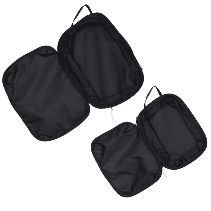 Wander & Roam Compression Packing Cube Set - A set of three black compression packing cubes with zippers and handles for easy organisation.